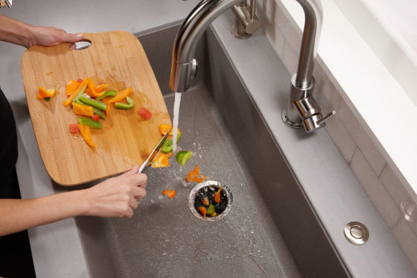 Garbage Disposal Maintenance | Only throw small pieces of food scraps down the disposal.